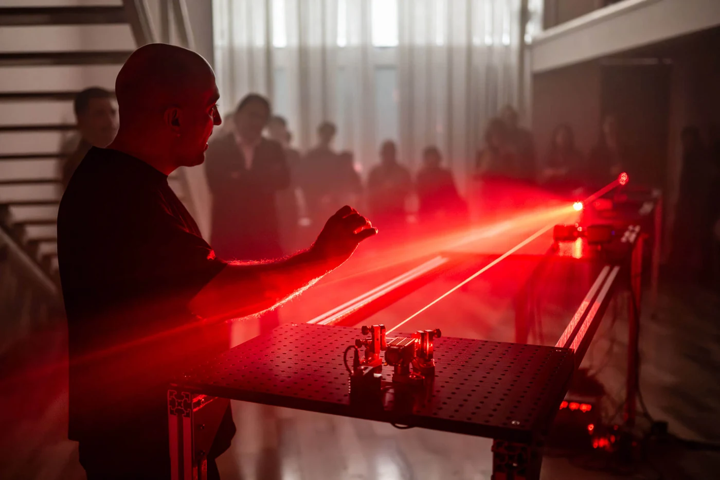 Dimensions of the Line — Hrvoje Hiršl interacting with the red laser installation at Galerija Forum